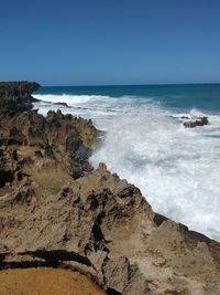 Scenic view of sea against clear sky