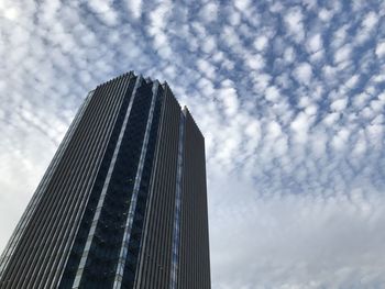 Low angle view of modern building against sky