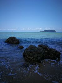 Scenic view of sea against clear sky