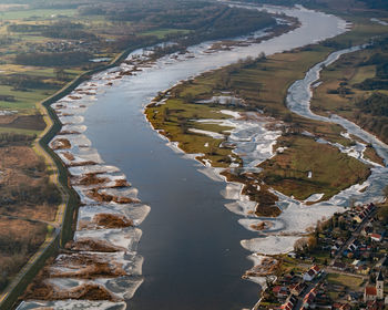 High angle view of river amidst land