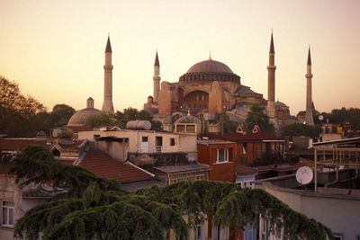 Panoramic view of buildings in city against sky