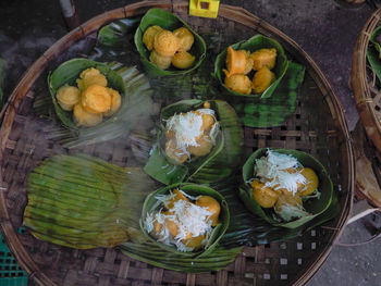 High angle view of vegetables in basket on table