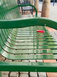 High angle view of metal railing against wall