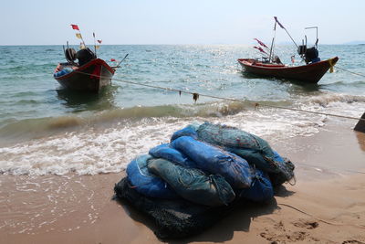 Boat moored in sea