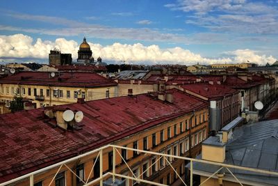 High angle view of buildings in city against sky