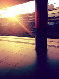 Sunlight against sky during sunset