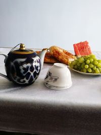 Close-up of fruits in bowl on table