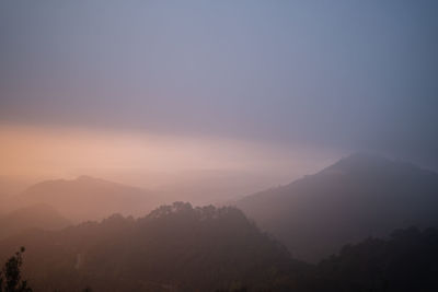 View of sea of cloud with a mountain and hill ,sunset at angkang ,chiang mai, thailand.