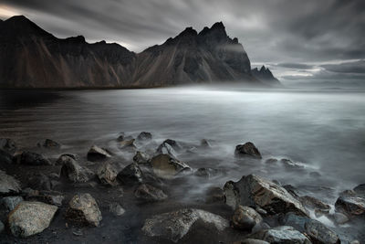 Iceland beach at night betwen stones