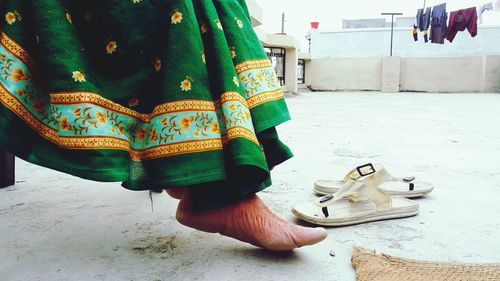 Low section of woman wearing sari