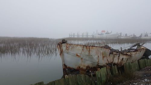 Panoramic view of lake against sky during winter