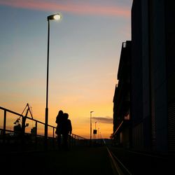 Silhouette of building at sunset