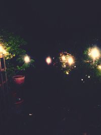 View of illuminated street light at night