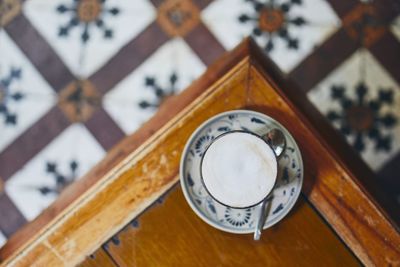 High angle view of clock on table