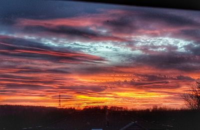 Scenic view of dramatic sky during sunset