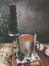 Iced coffee in mug on table