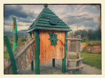 Built structure against cloudy sky