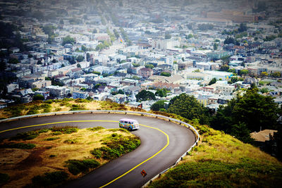 High angle view of road amidst buildings in city