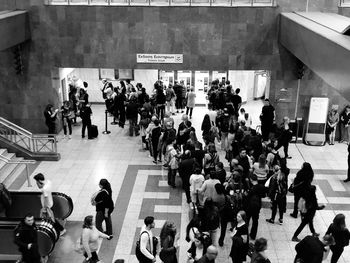 Group of people at railroad station