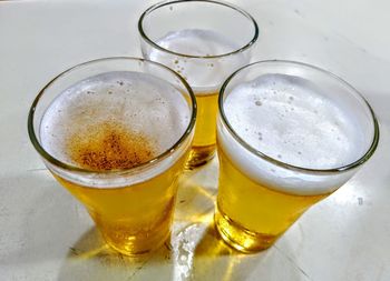 High angle view of beer glass on table