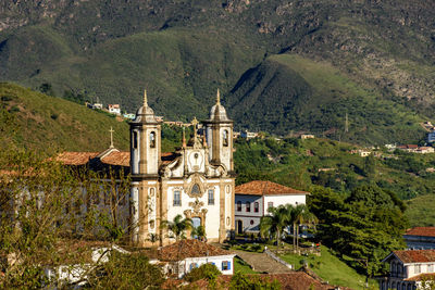 High angle view of historic building by mountains