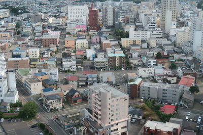 High angle view of street and buildings in city