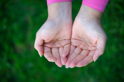 Low section of person against blurred background