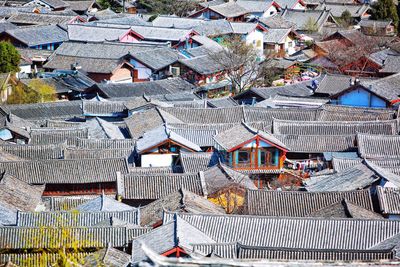 High angle view of houses in city