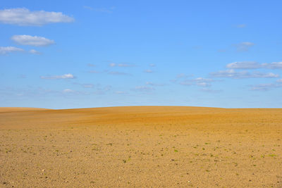 Scenic view of desert against sky