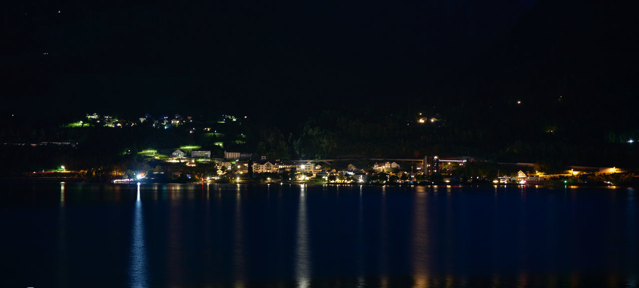 ILLUMINATED CITY AT NIGHT