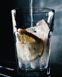 Close-up of ice cubes in glass