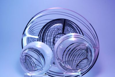 Close-up of glass against blue background