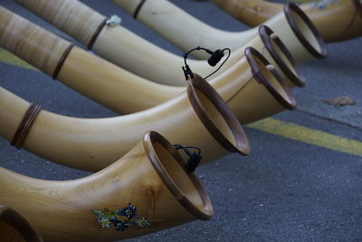 High angle view of shoes hanging on road