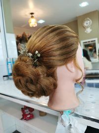 Rear view of girl looking away at home