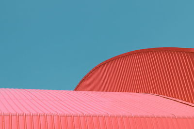 Low angle view of building against clear blue sky