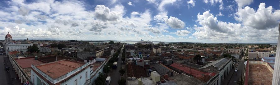 Panoramic view of town against sky