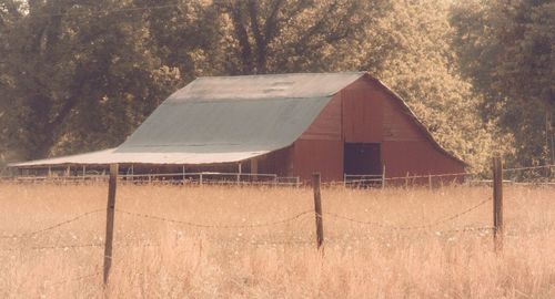 View of barn on field