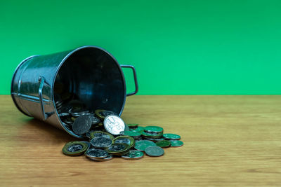 Close-up of coins on table