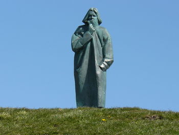 Low angle view of statue against clear sky