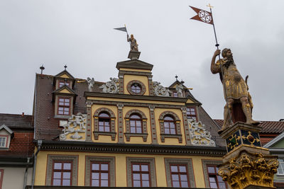 Low angle view of historic building against sky