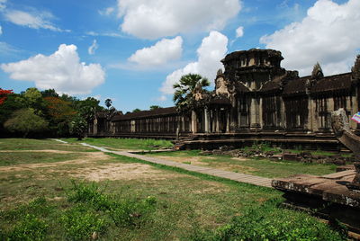 View of old ruin building against cloudy sky