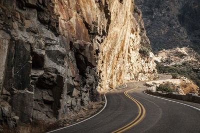 Road passing through rock formation