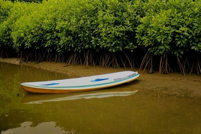 Boat floating on lake