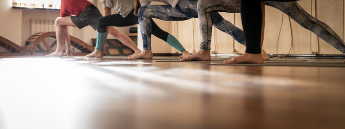 Low section of people standing on floor