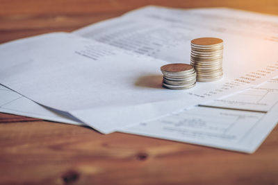 Close-up of coins on table