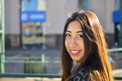 Portrait of smiling young woman