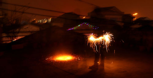 Firework display at night