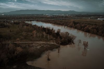 Scenic view of river against sky