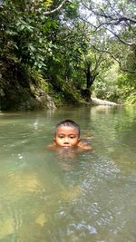 Portrait of girl in lake