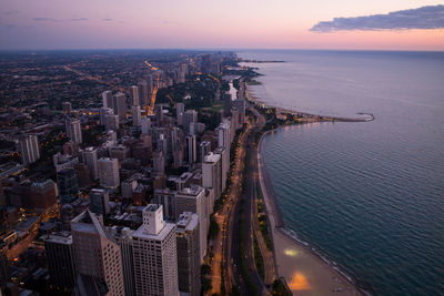 High angle view of city buildings at waterfront